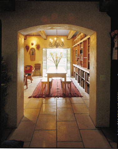 You can book on good design in the dining area/library, the main artery of the compound. Floors are grounded with terra tiles, thick PISE pavers grouted to resemble their commercial cousins. Recycled beams form an overhead canopy.